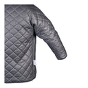 Gros plan sur la doublure intérieure matelassée de la parka imperméable PROS Wear modèle 103/OCS - vue intérieure.